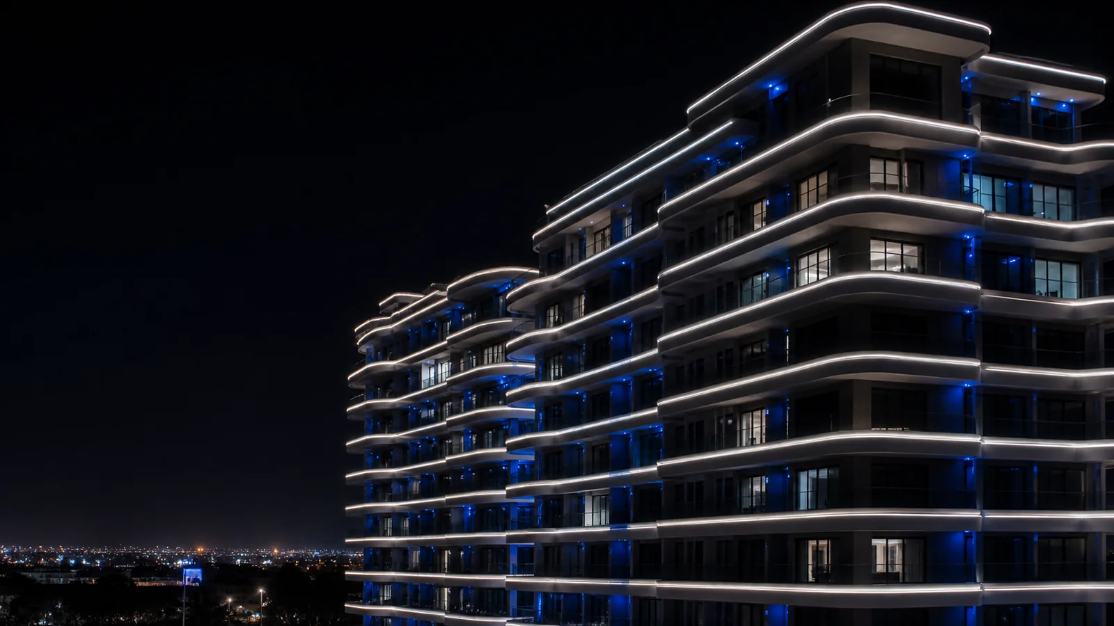 GCC commercial facade with linear LED lighting