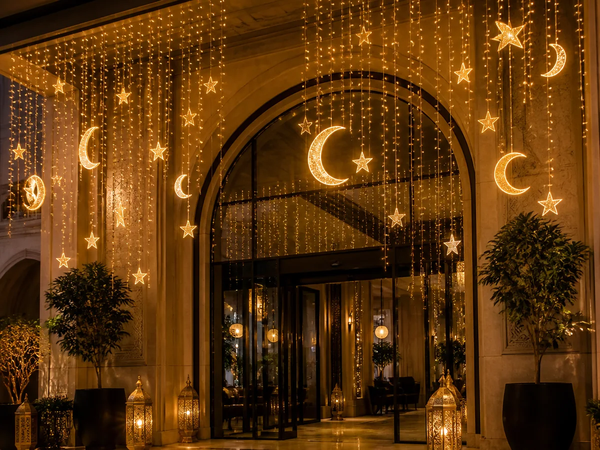 Warm-gold Ramadan curtain lighting concept for a hotel entrance
